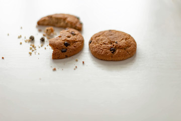 oatmeal cookies with chocolate chips on white table