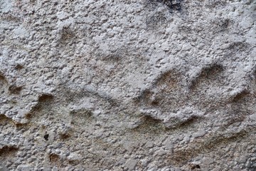 Close up detailed surface of granite and concrete mixed walls in high resolution