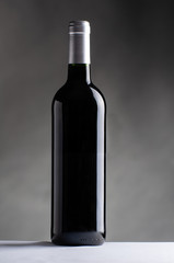Black wine bottle isolated