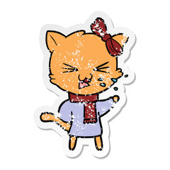 distressed sticker of a cartoon cat