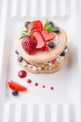 Delicious and healthy dessert with fresh berries and cream