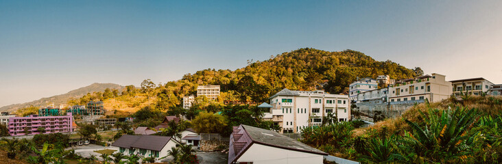 Fototapeta na wymiar bungalows and hotels in phuket island. Unnamed Road. Patong