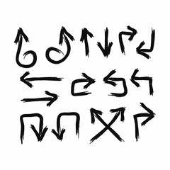 Set of arrows drawn by hand with a brush in grunge style. Vector illustration.