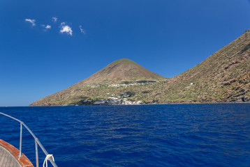 Approaching a tiny island on our boat