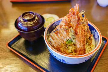 Close up shot of a plate of delicious deep fried shrimp with rice