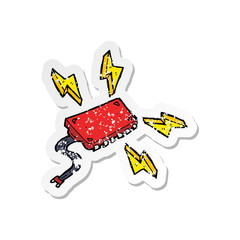 retro distressed sticker of a cartoon computer chip