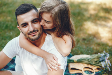 Obraz premium Beautiful couple spend time in a summer park