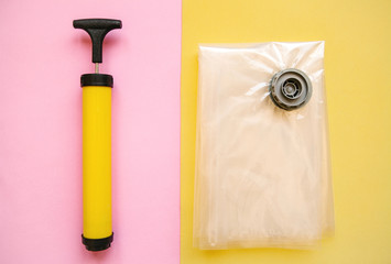 Vacuum pump for vacuum bags for packing clothes and reducing their size for storage.