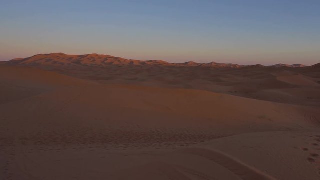 Sunset Timelapse wide shot of dunes of Erg Chebbi Desert at Sunset, Morocco