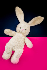 toy hare on a pink background