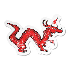 distressed sticker cartoon of a dragon wearing santa hat