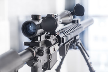 Fototapeta na wymiar Sniper Rifle on Table