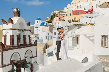 Young couple on the background  Santorini