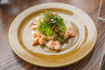 spring salad with herbs and boiled shrimps