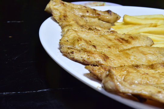 pollo papas fritas