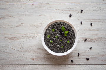 Black soup mashed black beans. Top view.