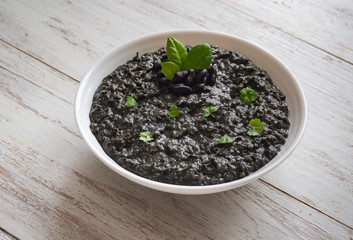 Black soup mashed black beans. Top view.