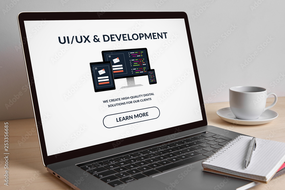 Wall mural ui/ux and development concept on modern laptop computer screen