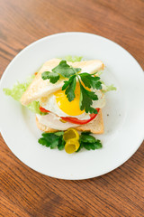 sandwich with tomato and baked egg