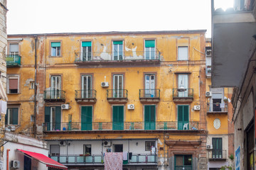 Fototapeta na wymiar NAPLES, ITALY - January 15, 2018 : Antique building in Naples city, Italy