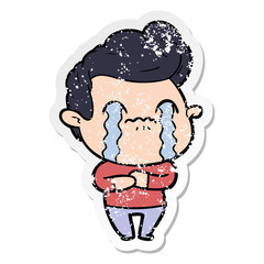 distressed sticker of a cartoon man crying