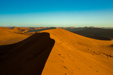 Huge sand dune in Sossusvlei National Park in Namibia at Sunset