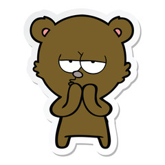 sticker of a bored bear cartoon