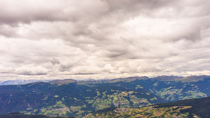 Alpe di Siusi, Seiser Alm with Sassolungo Langkofel Dolomite, a view of a large mountain in the background