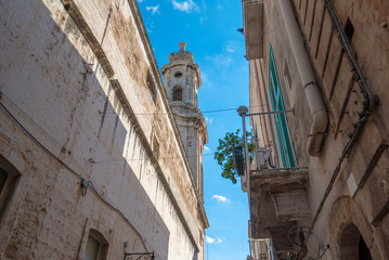 Street and alley with a view to the bell tower of Church of Saint Joseph and Anna  (Chiesa dei...