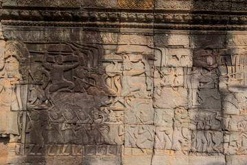 Relief on the wall of gallery of Bayon temple in Angkor Thom. Cambodia