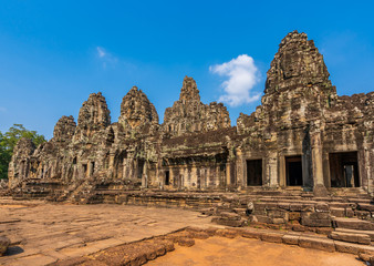 Fototapeta na wymiar Bayon temple in Angkor Thom, Cambodia: first enclosure wall, galleries and face towers. West facade