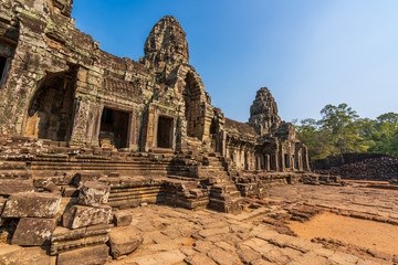 Bayon temple in Angkor Thom, Cambodia: first enclosure wall, galleries and face towers. West facade