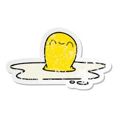 distressed sticker of a quirky hand drawn cartoon fried egg