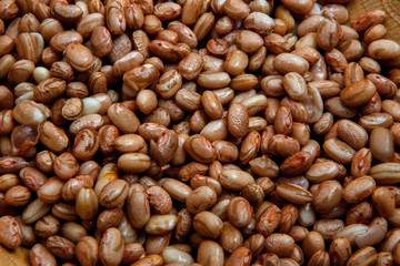 Carioca Beans into a bowl. Agriculture, seed.