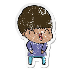Obraz premium distressed sticker of a happy cartoon boy