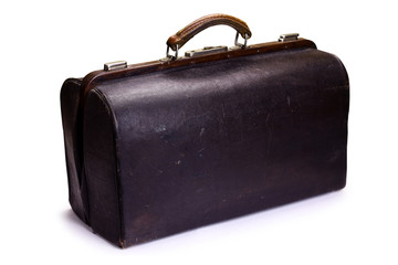 Brown leather old luggage bag isolated on white. Brown vintage valise isolated on a white background. Part of set.