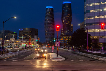 Mississauga, Canada, February 14, 2019: Twin towers of Absolute Condos in, these high-rise Mississauga condos were built in 2007 by Fernbrook Homes. Located in Mississauga's City Centre neighbourhood