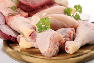 raw meat. Different types of raw pork meat, chicken and beef with spices and herbs