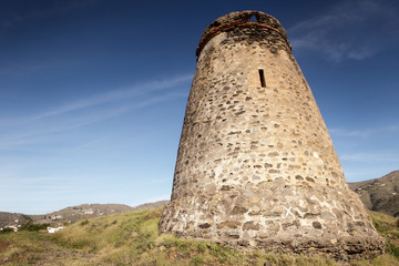 old stone watchtower in almunecar spain