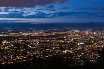 Fototapeta na wymiar View to the Sofia city at dusk. View from the Kopitoto Hill, Vitosha Mountain, Bulgaria