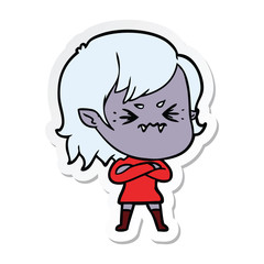 sticker of a annoyed cartoon vampire girl