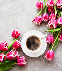 Cup of coffee and tulips