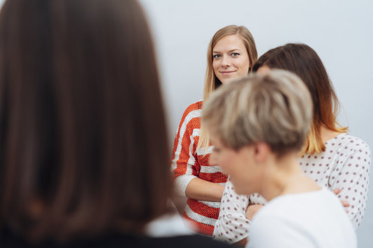 Group of young businesswomen having a discussion