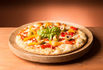 Vegetarian pizza on the wooden table