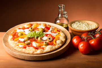 Vegetarian pizza on the wooden table