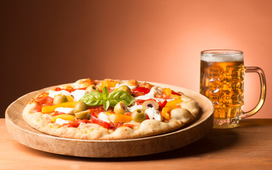 Vegetarian pizza on the wooden table