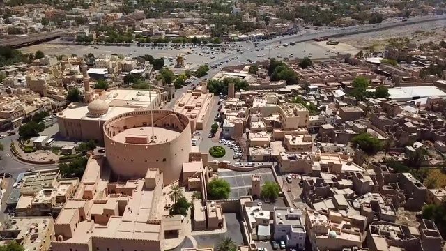 The Nizwa Fort is a large castle in Nizwa, Oman.