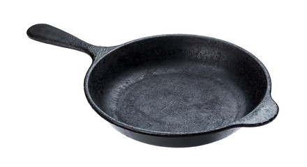 Old cast iron pan isolated on white background with clipping path
