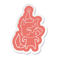 clever cartoon  sticker of a fox wearing santa hat