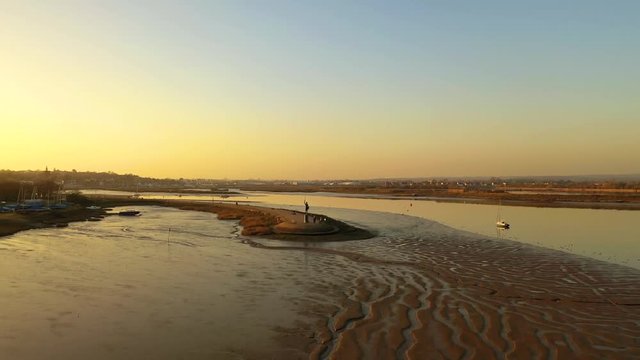 Aerial sequence tracking the River Chelmer near Maldon in Essex and featuring the Statue of Byrhtnoth who was Ealdorman of Essex and died 11 August 991 at the Battle of Maldon. 